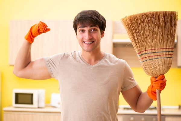 man with broom